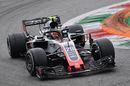Kevin Magnussen runs wide in the Haas