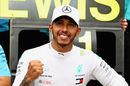 Race winner Lewis Hamilton celebrates after race