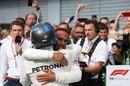 Race winner Lewis Hamilton and Valtteri Bottas celebrates in parc ferme