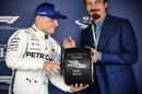 Pole sitter Valtteri Bottas accepts the Pirelli Pole Position Award