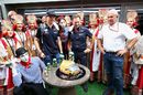 Max Verstappen is greeted as he walks in the Paddock on his 21st birthday