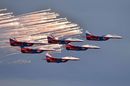 Russian aerobatic team Strizhi performs prior to the start