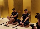 Daniel Ricciardo and Max Verstappen sitting down