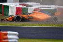 Fernando Alonso spins