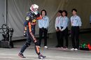 Daniel Ricciardo walks at the pit