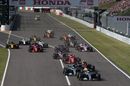 Lewis Hamilton leads Valtteri Bottas at the start of the race