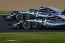 Race winner Lewis Hamilton and Valtteri Bottas celebrates on the slow down lap