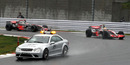 Lewis Hamilton and Fernando Alonso behind the safety car