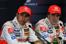 Lewis Hamilton (L) with McLaren team-mate Fernando Alonso