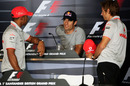 Lewis Hamilton, Mark Webber and Jenson Button chat during Thursday's press conference