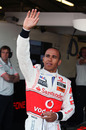 Lewis Hamilton waves to his fans