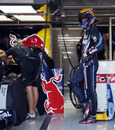 Mark Webber relaxes in the pits
