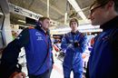 Brendon Hartley talks with his team in the garage