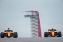 Fernando Alonso and Stoffel Vandoorne on track in the McLaren