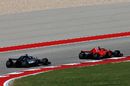 Kimi Raikkonen and Lewis Hamilton battle for position