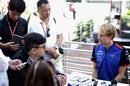 Brendon Hartley talks to the media in the Paddock
