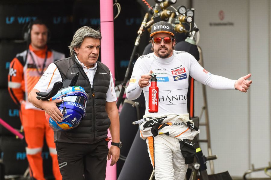 Fernando Alonso walks in the pitlane