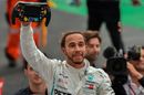 World Champion Lewis Hamilton celebrates in parc ferme