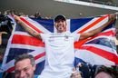 World Drivers Champion Lewis Hamilton celebrates with his team
