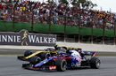 Pierre Gasly and Carlos Sainz battle for position