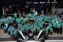 Lewis Hamilton celebrates with the Mercedes team after winning the F1 Brazil Grand Prix and taking the constructors title