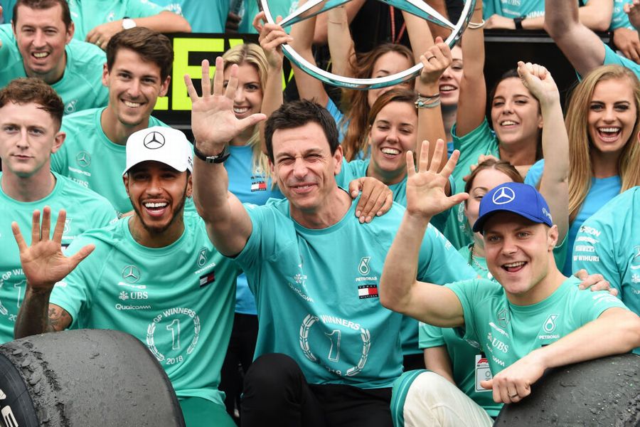 Lewis Hamilton, Valtteri Bottas, Toto Wolff and the rest of the Mercedes team celebrate after winning the F1 Constructors Championship