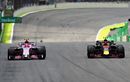 Esteban Ocon attempts to unlap himself from race leader Max Verstappen