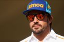 Fernando Alonso walks in the paddock