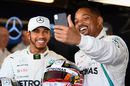 Lewis Hamilton and Will Smith take a selfie in the Mercedes garage