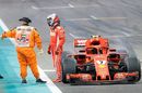 Kimi Raikkonen stops after his car's failure
