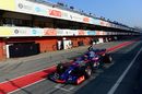 Alexander Albon powers down the pit lane in the Toro Rosso