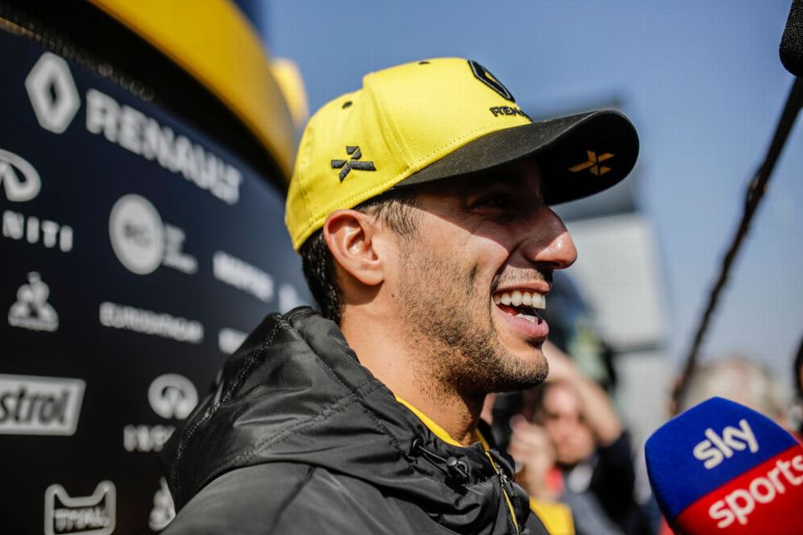 Daniel Ricciardo talks with the media