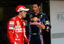 Mark Webber talks to Fernando Alonso after qualifying