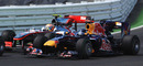 Lewis Hamilton and Sebastian Vettel touch wheels, resulting in Vettel's tyre being shredded