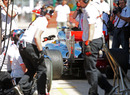 Lewis Hamilton leaves a practice pit stop