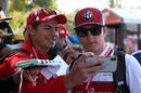 Kimi Raikkonen poses for selfies with fans