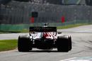 Kimi Raikkonen heads down the pit lane in the Alfa Romeo
