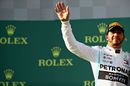 Lewis Hamilton celebrates on the podium