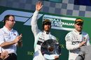 Race winner Valtteri Bottas and Lewis Hamilton celebrate on the podium