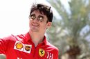 Charles Leclerc looks relaxed in the paddock