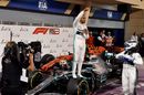 Race winner Lewis Hamilton celebrates in parc ferme