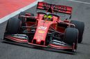 Mick Schumacher powers down the pit lane in the Ferrari