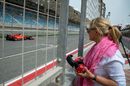 Corina Schumacher, Mick's mother, watches her son drive his first laps for Ferrari