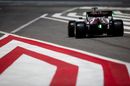 Mick Schumacher heads down the pit lane in the Alfa Romeo