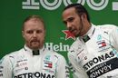Race winner Lewis Hamilton speaks with Valtteri on the podium
