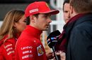 Charles Leclerc speaks with the media after he crashed in the qualifying