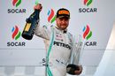 Race winner Valtteri Bottas celebrate on the podium
