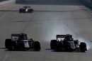 Kevin Magnussen and Antonio Giovinazzi battle for position