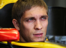 Vitaly Petrov sits in his Renault's cockpit