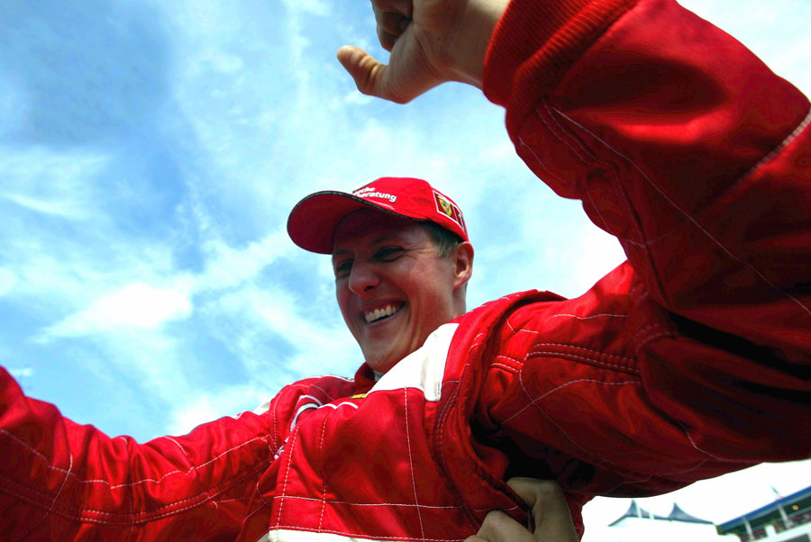 Michael Schumacher celebrates his fifth world championship